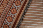 Load image into Gallery viewer, Close-up of cotton throw on bed
