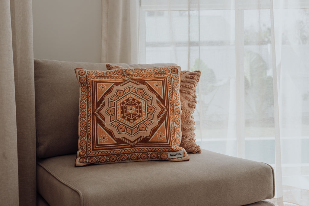 Pillowcase on chair with sheer curtains